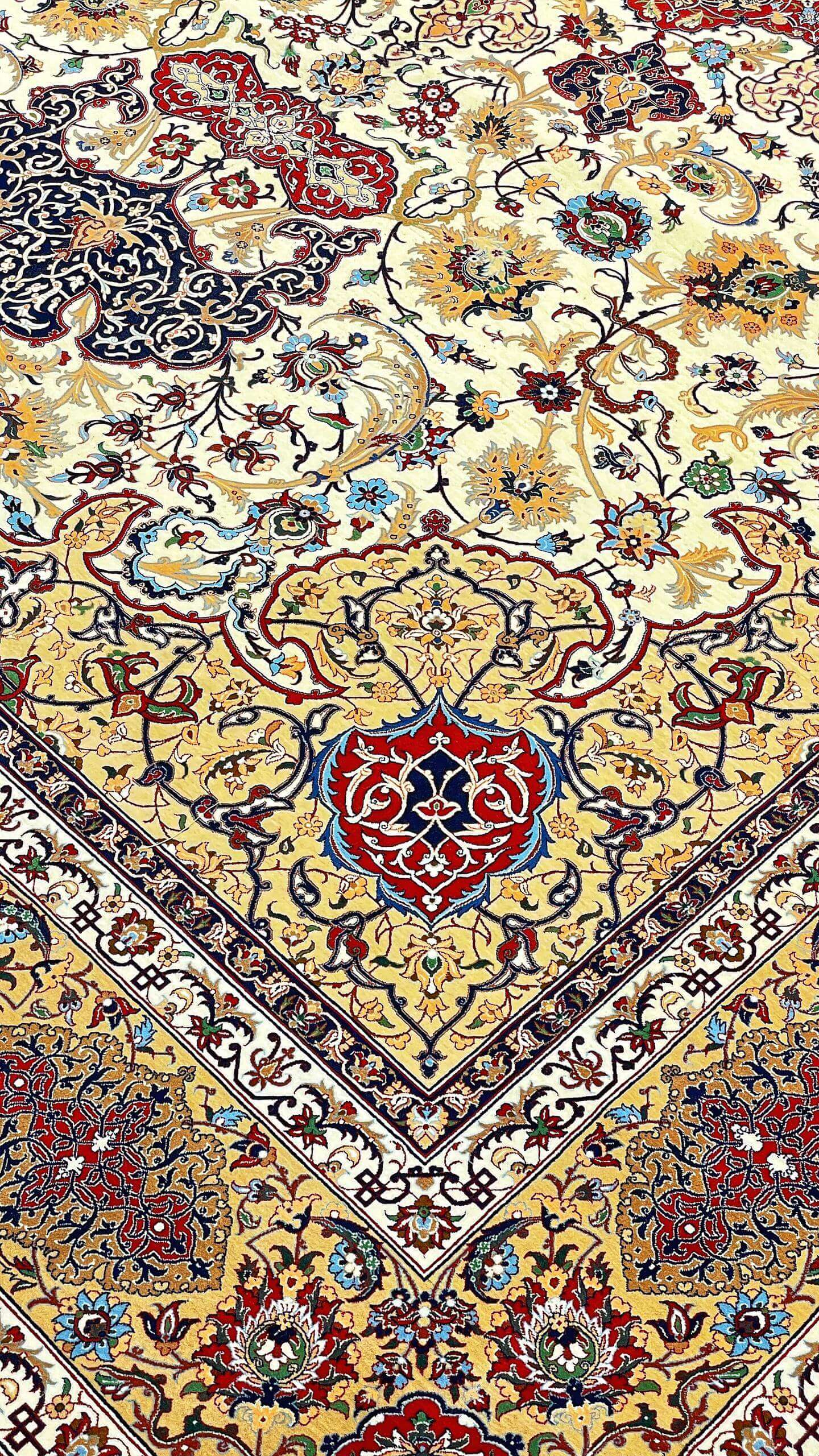 "Seirafian rug featuring intricate floral motifs and vibrant natural colors."